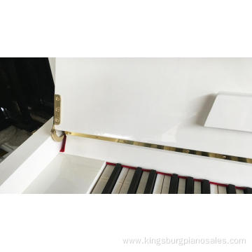 white upright piano is selling